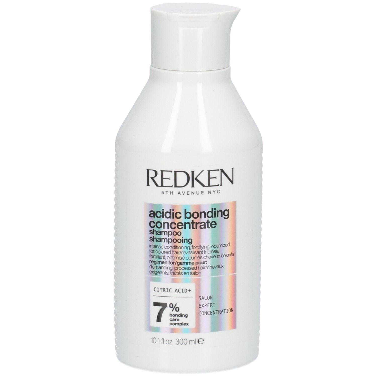 Flacone di shampoo bianco. Etichetta con nome del prodotto e ingredienti. Marca: Redken. 300ml.