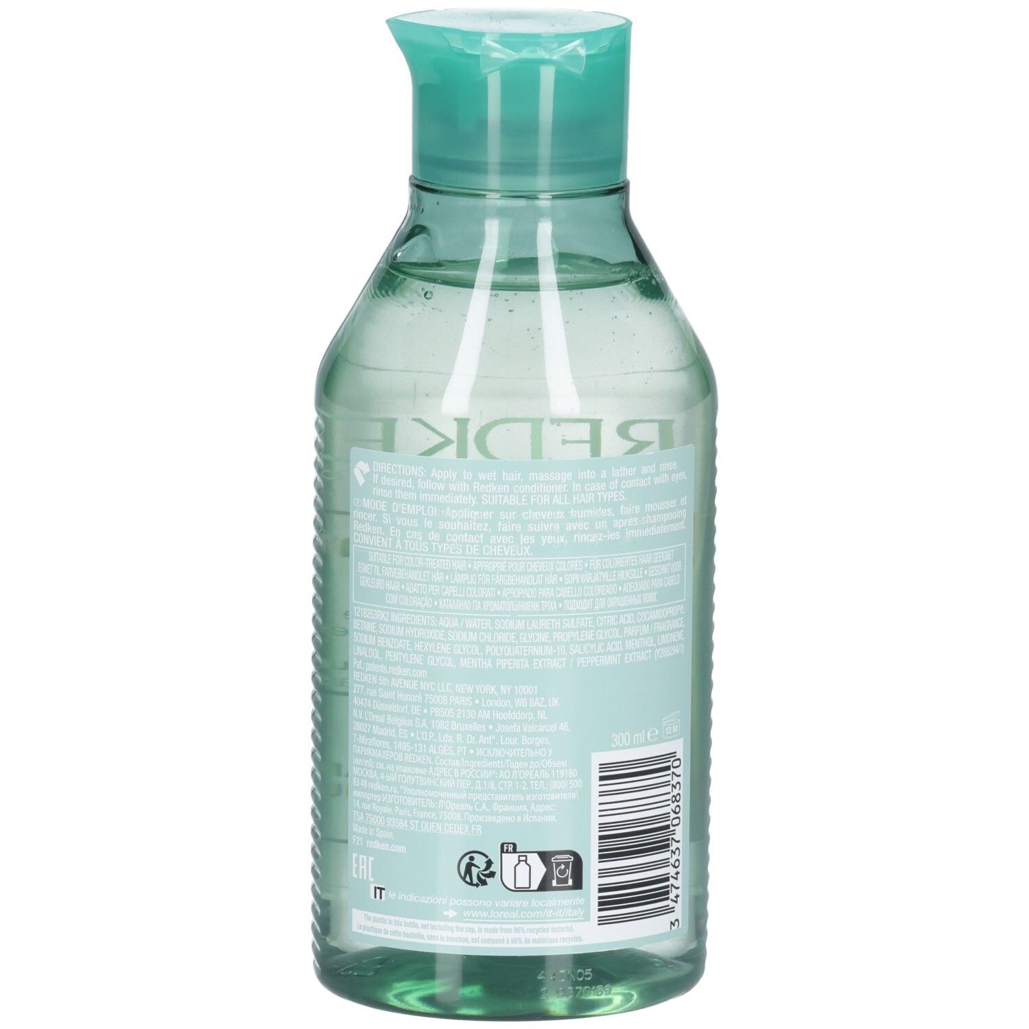 Retro della bottiglia di shampoo Redken Amino Mint. Bottiglia verde con tappo verde menta. Testo e codice a barre.
