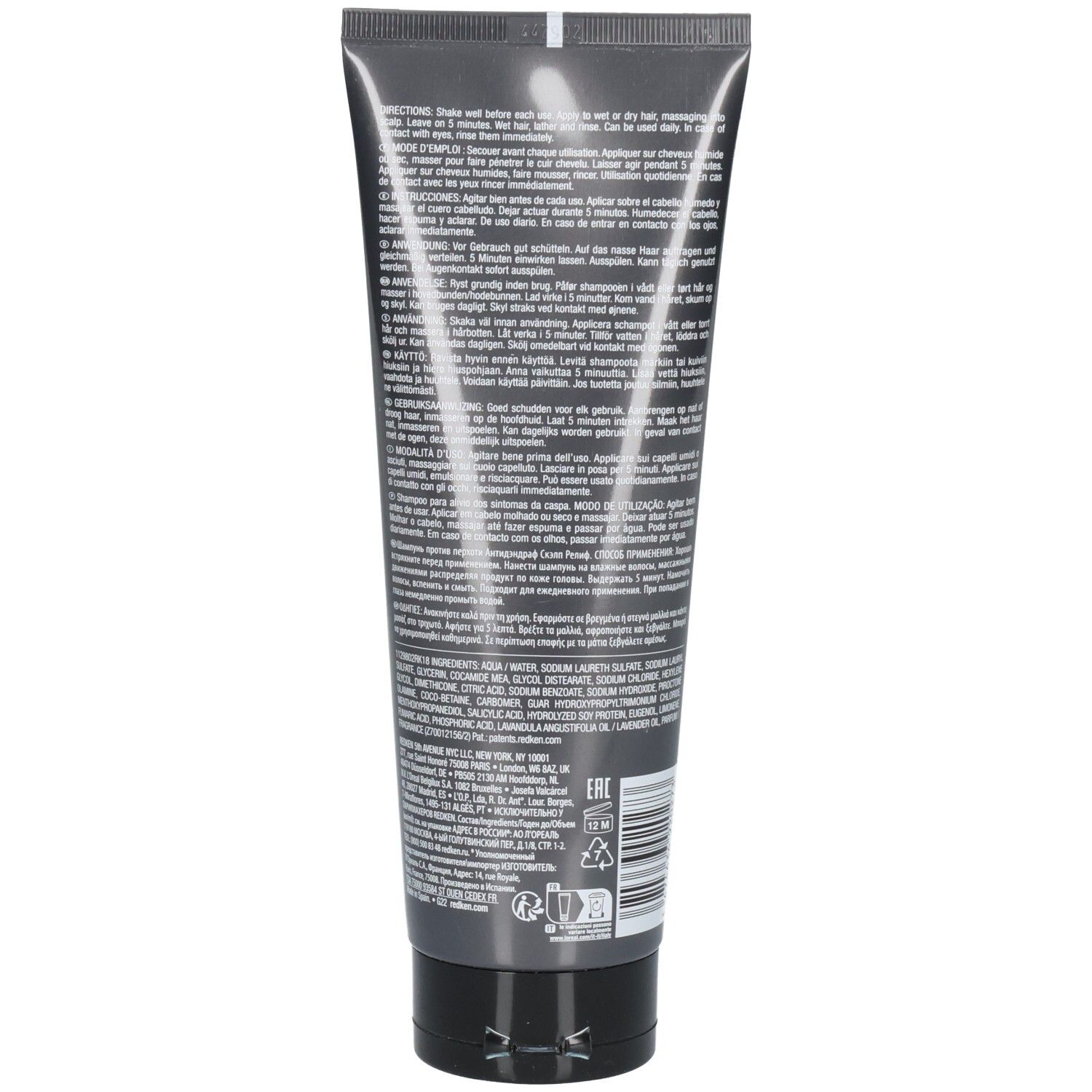 Retro di un tubo di shampoo grigio. Testo con istruzioni e ingredienti. Contiene informazioni sull'uso e sugli ingredienti.