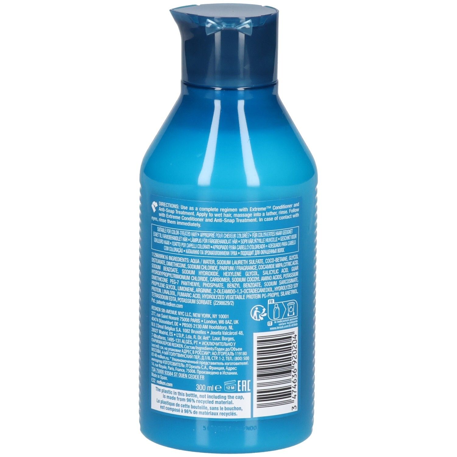 Retro di un flacone di shampoo blu. Testo: ingredienti, istruzioni per l'uso, codice a barre, 300 ml, materiale riciclato.
