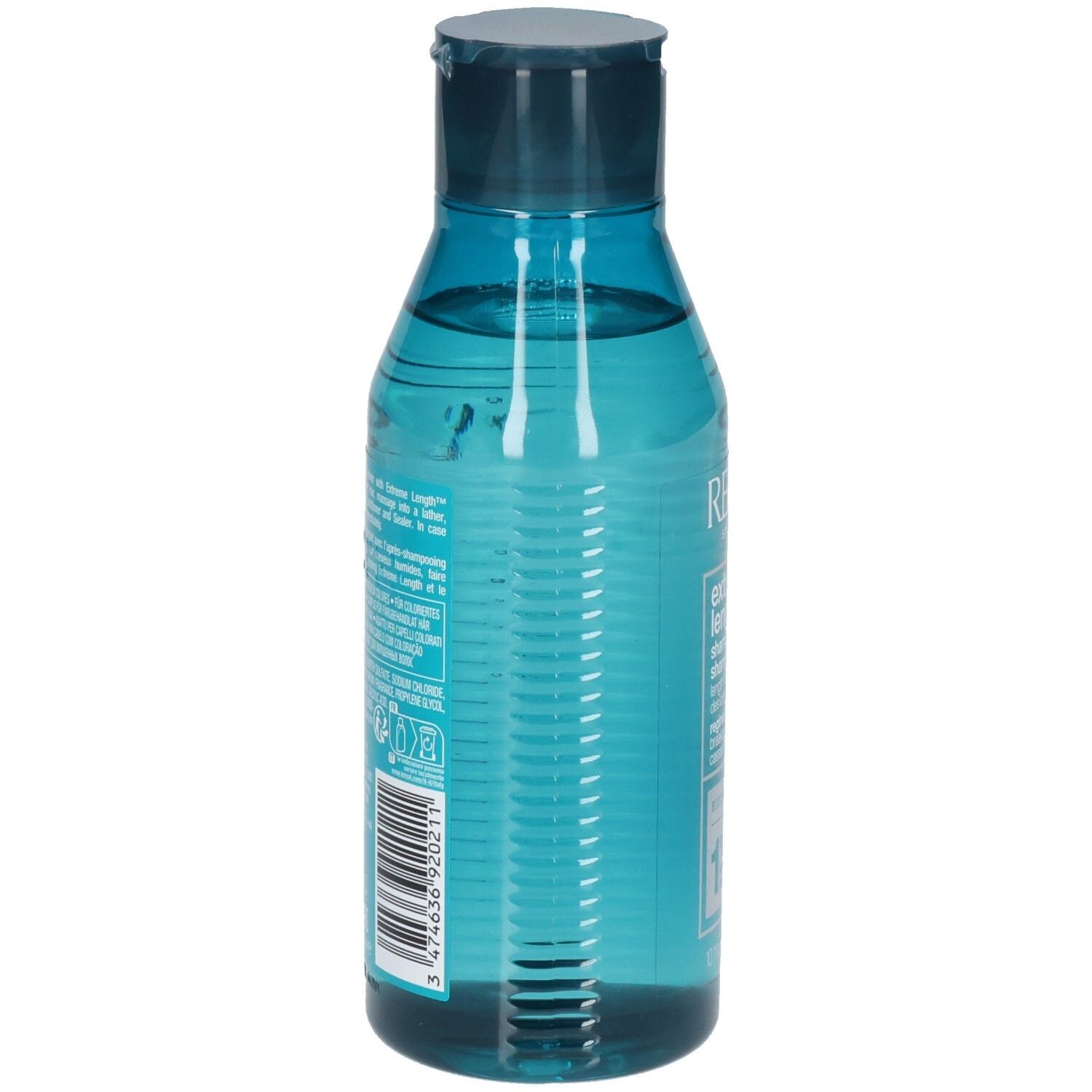 Retro di un flacone di shampoo blu trasparente. Codice a barre e testo. Contiene ingredienti e istruzioni.
