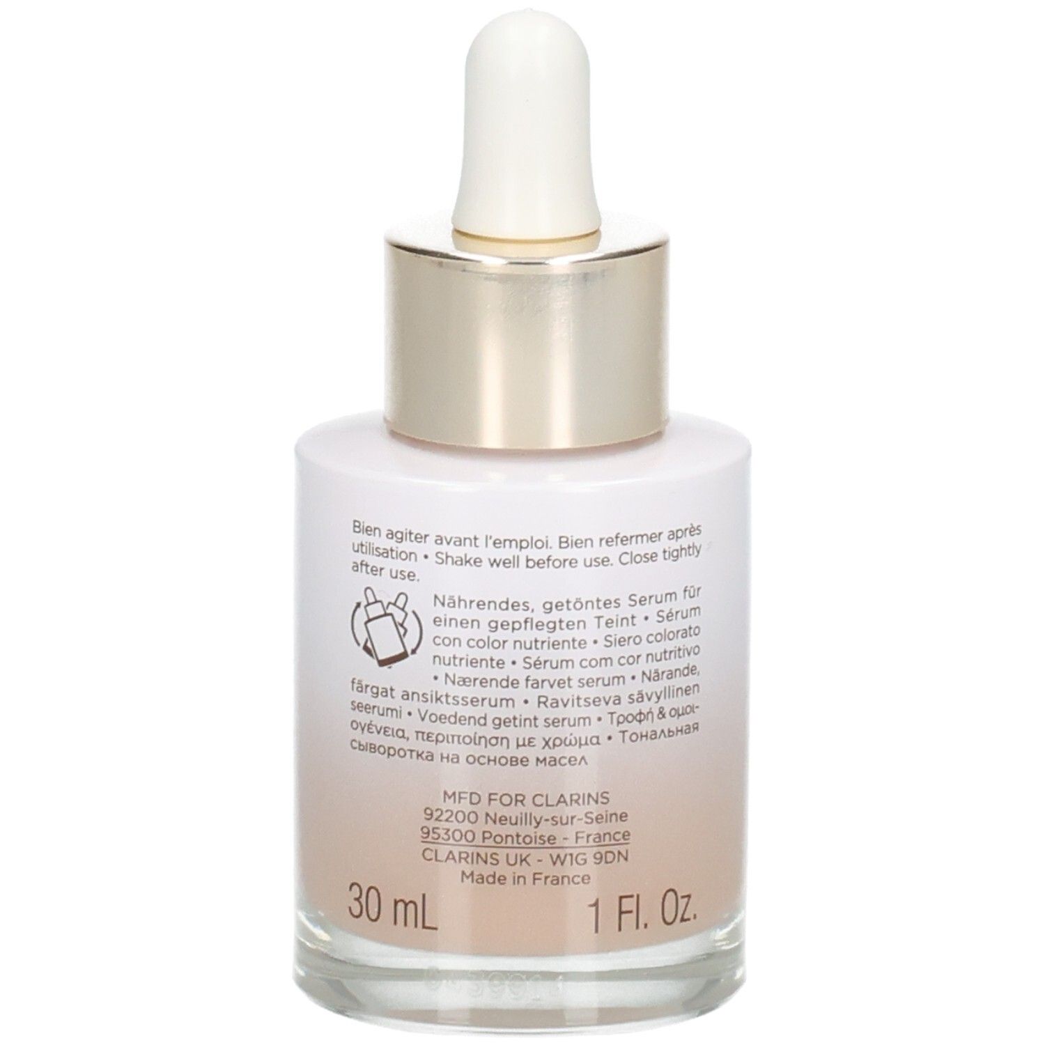 Flacone Clarins Tinted Oleo-Serum con contagocce, retro con istruzioni per l'uso e indicazione del volume 30ml.