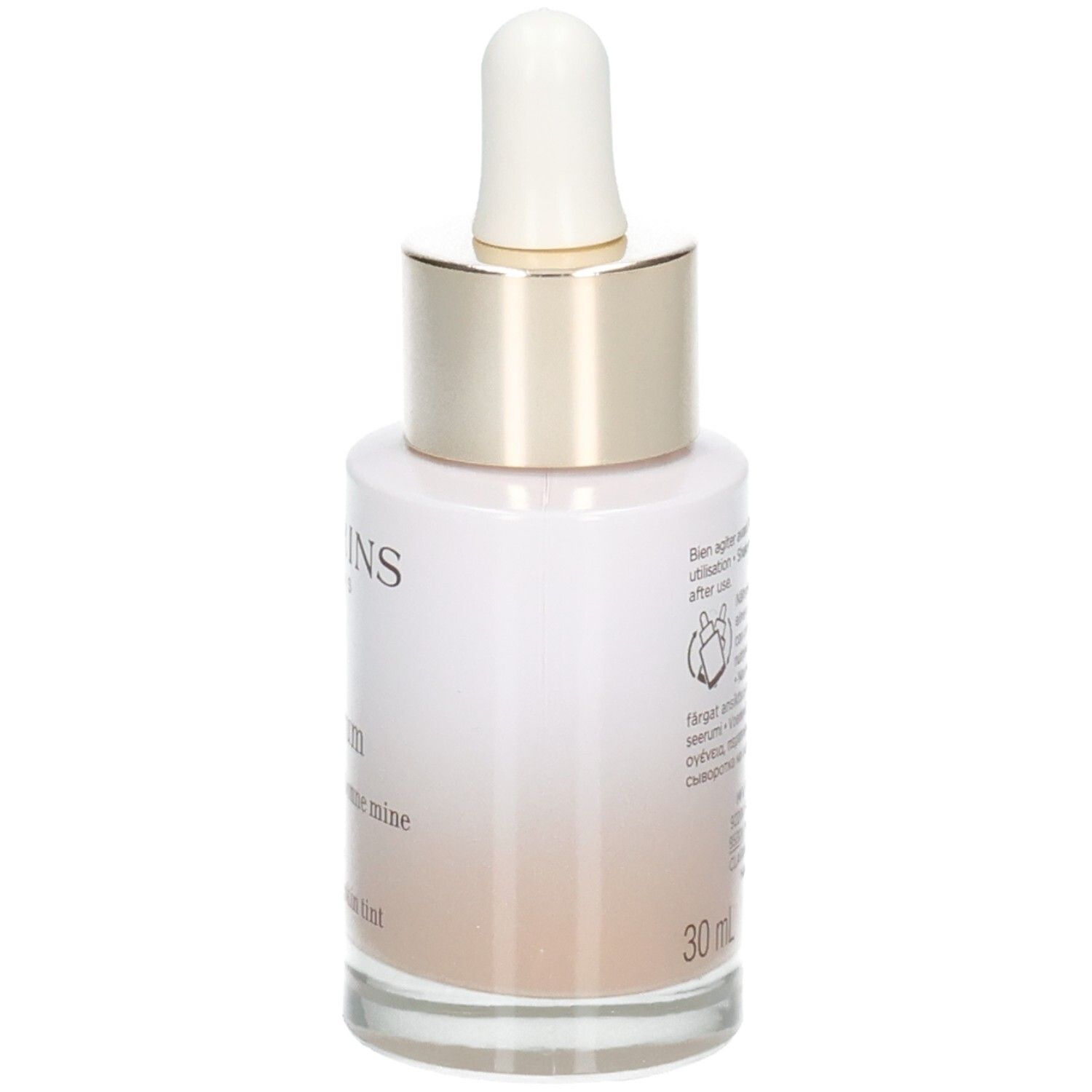 Flacone Clarins Tinted Oleo-Serum con contagocce, lato con istruzioni per l'uso e indicazione del volume 30ml.
