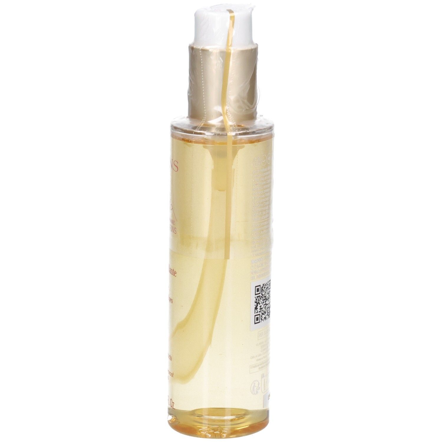 Clarins Total Cleansing Oil: liquido dorato in flacone con erogatore, vista laterale.