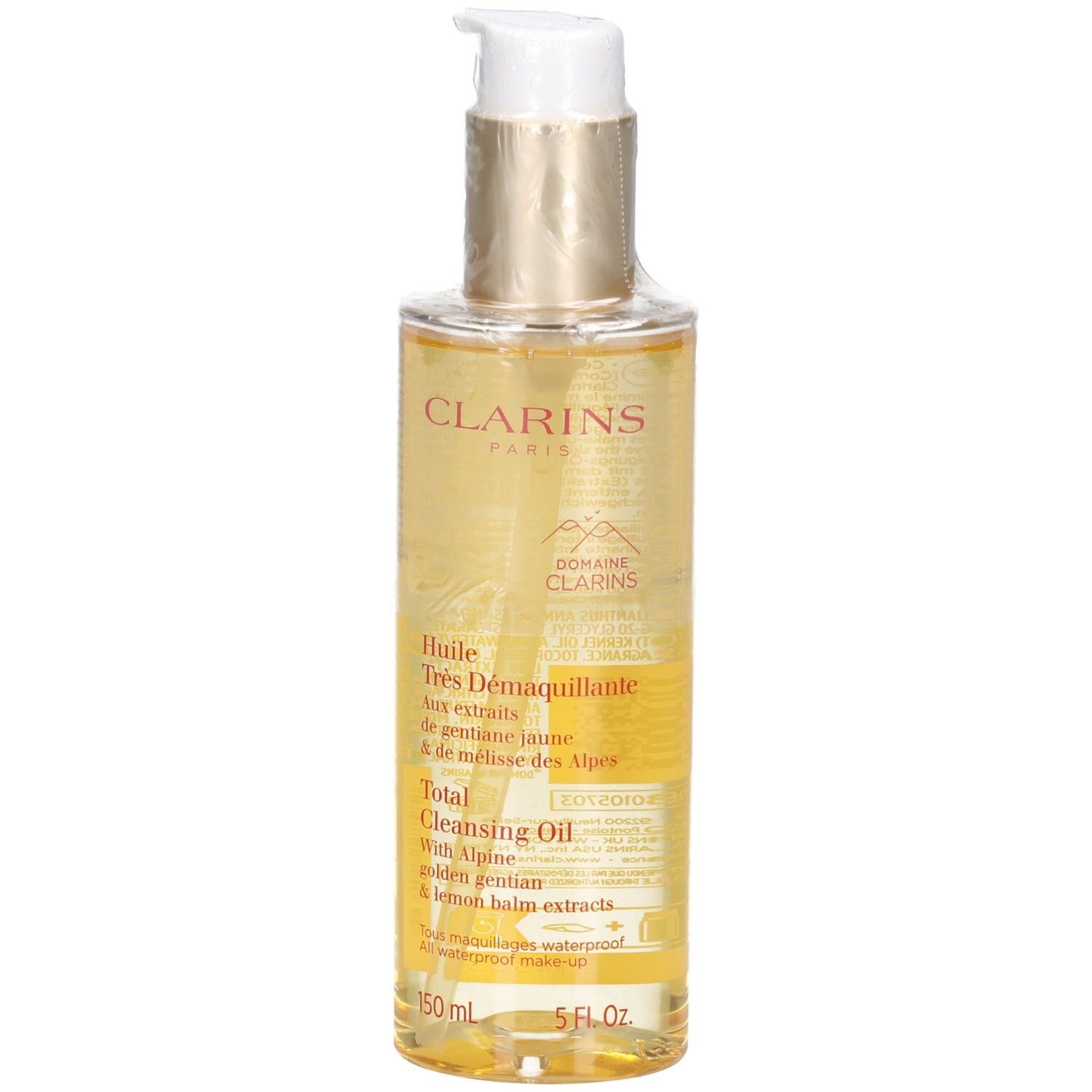 Clarins Total Cleansing Oil: liquido dorato in flacone con erogatore e etichetta.
