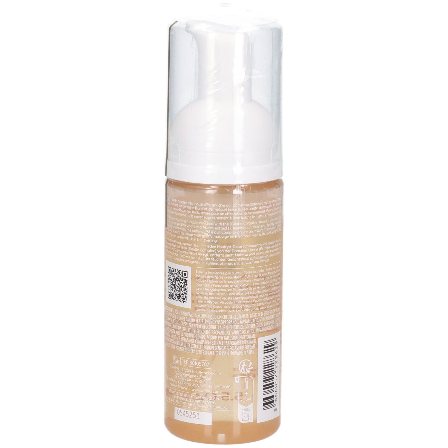 Lato di una bottiglia di mousse detergente Clarins con codice QR e testo. Erogatore trasparente con liquido giallo.