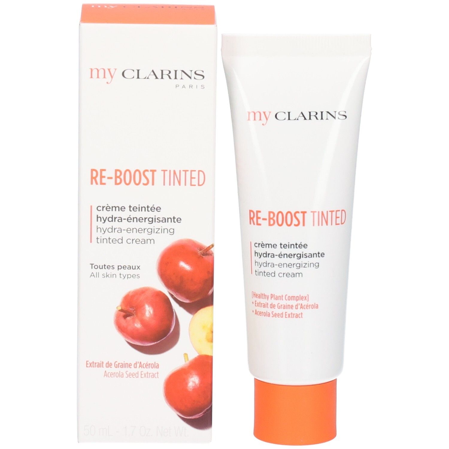 Tubo e scatola di cartone con arance e scritta "my CLARINS RE-BOOST TINTED".