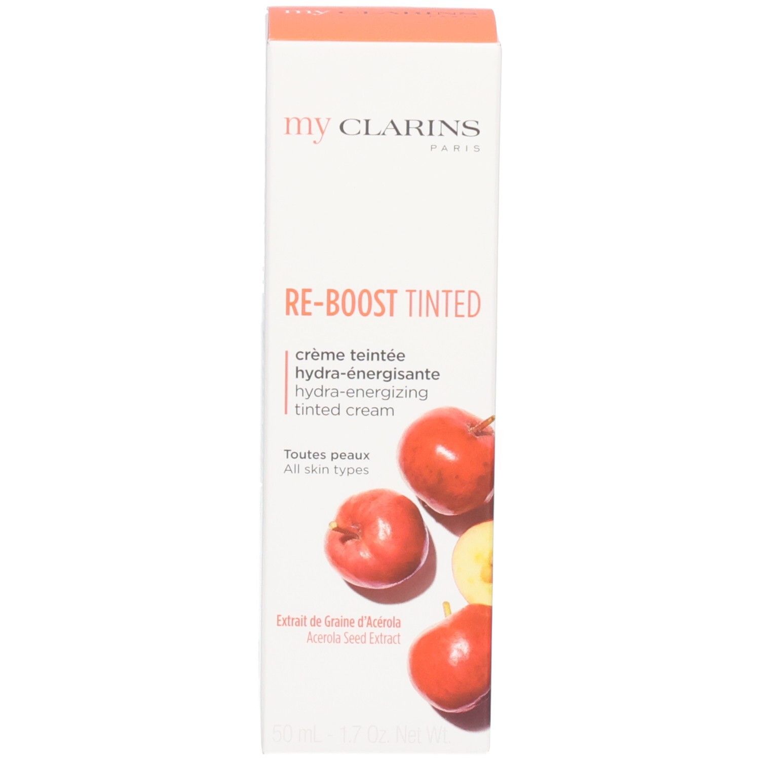 Scatola di cartone con arance e scritta "my CLARINS RE-BOOST TINTED".