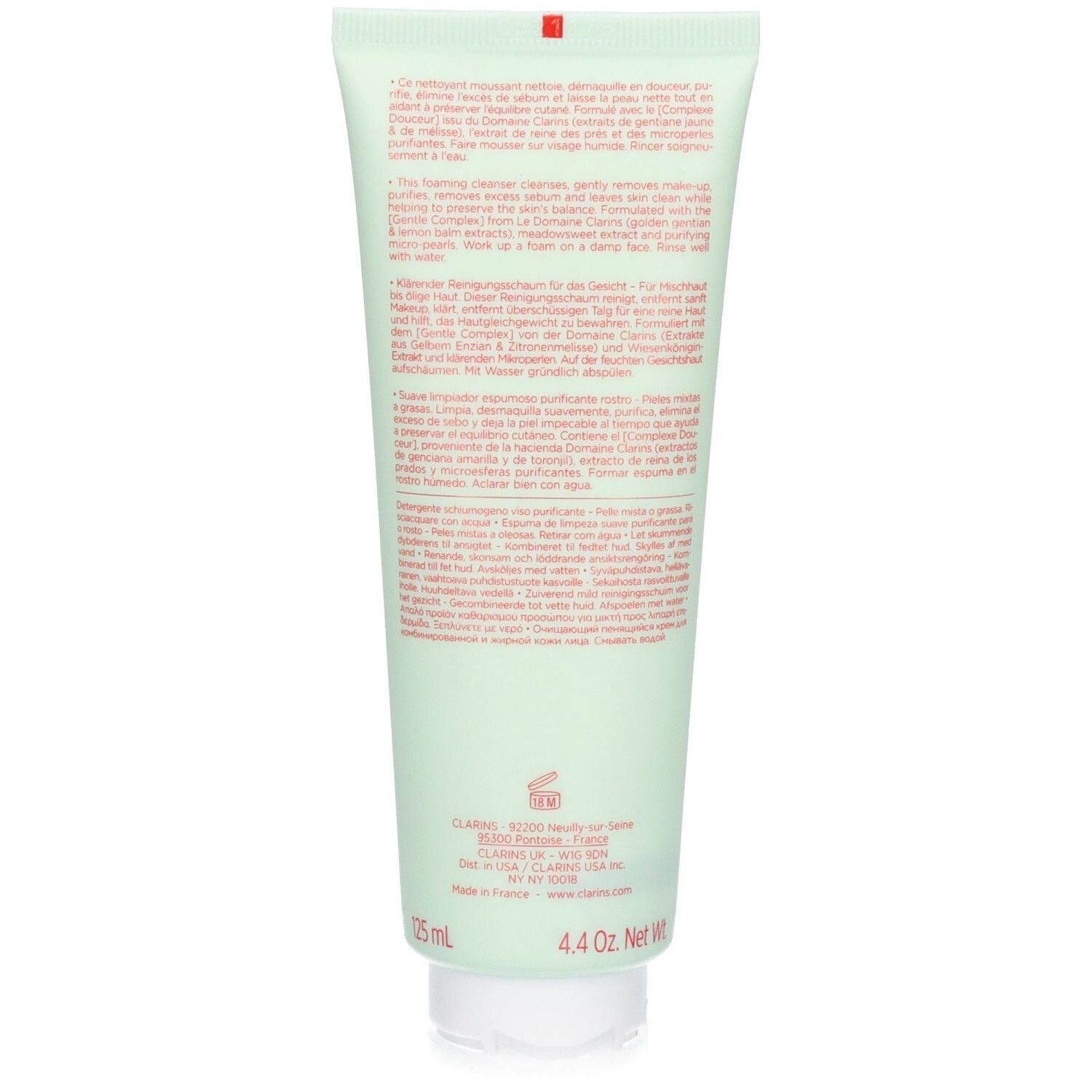 Retro di un tubo verde chiaro di detergente Clarins. Contiene informazioni sul prodotto e sugli ingredienti.