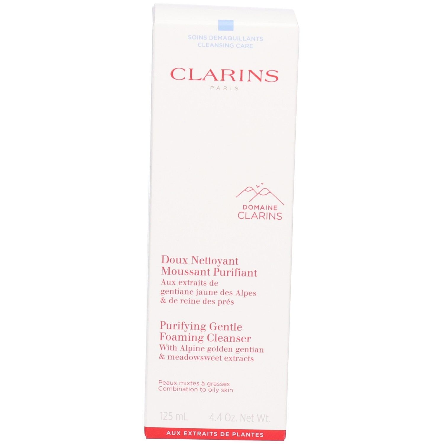 Scatola bianca per detergente Clarins. Nome del marchio rosso e informazioni sul prodotto sul davanti.