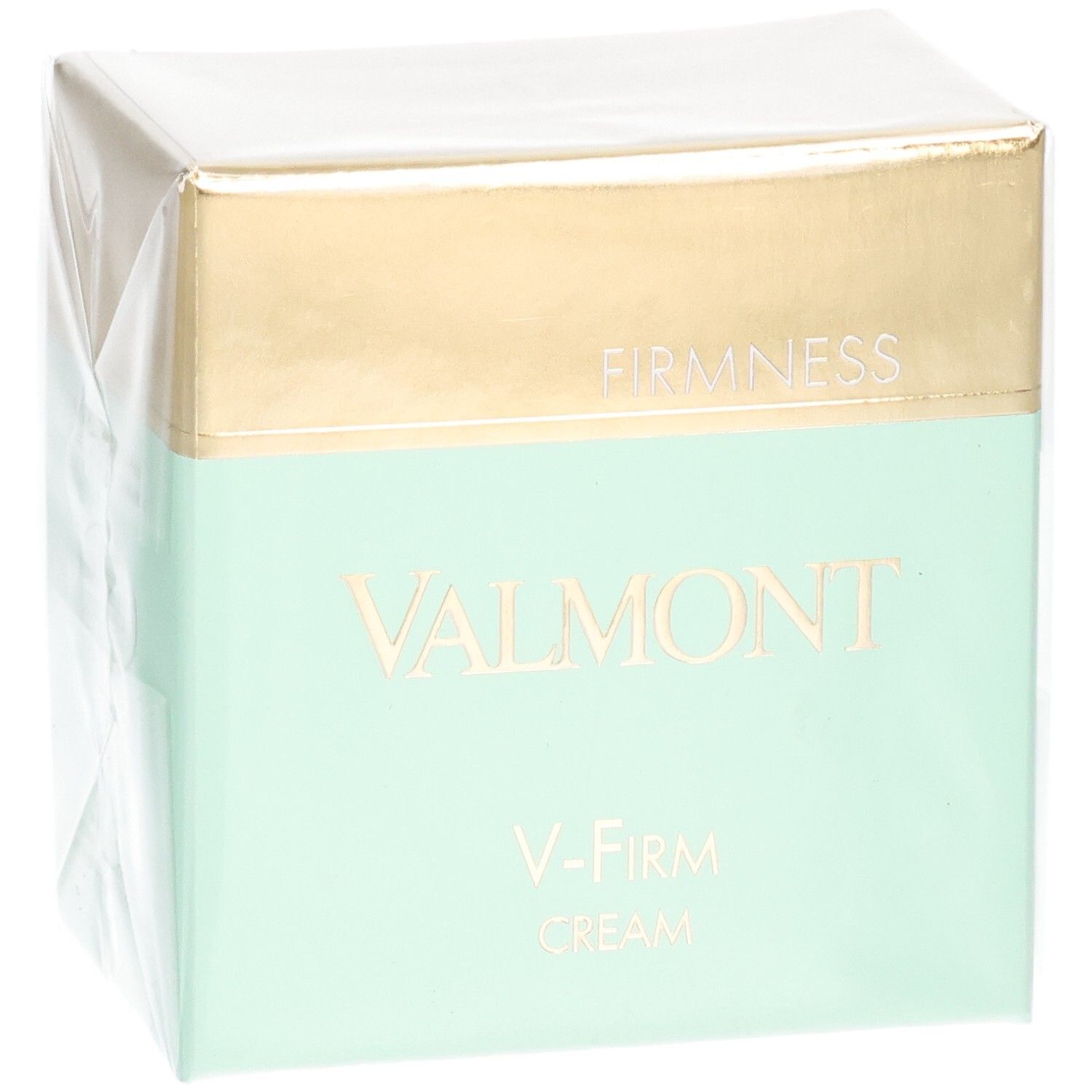 Confezione Valmont V-Firm Cream con fascia dorata e verde menta. "FIRM NESS" e "VALMONT" sono stampati sul davanti.