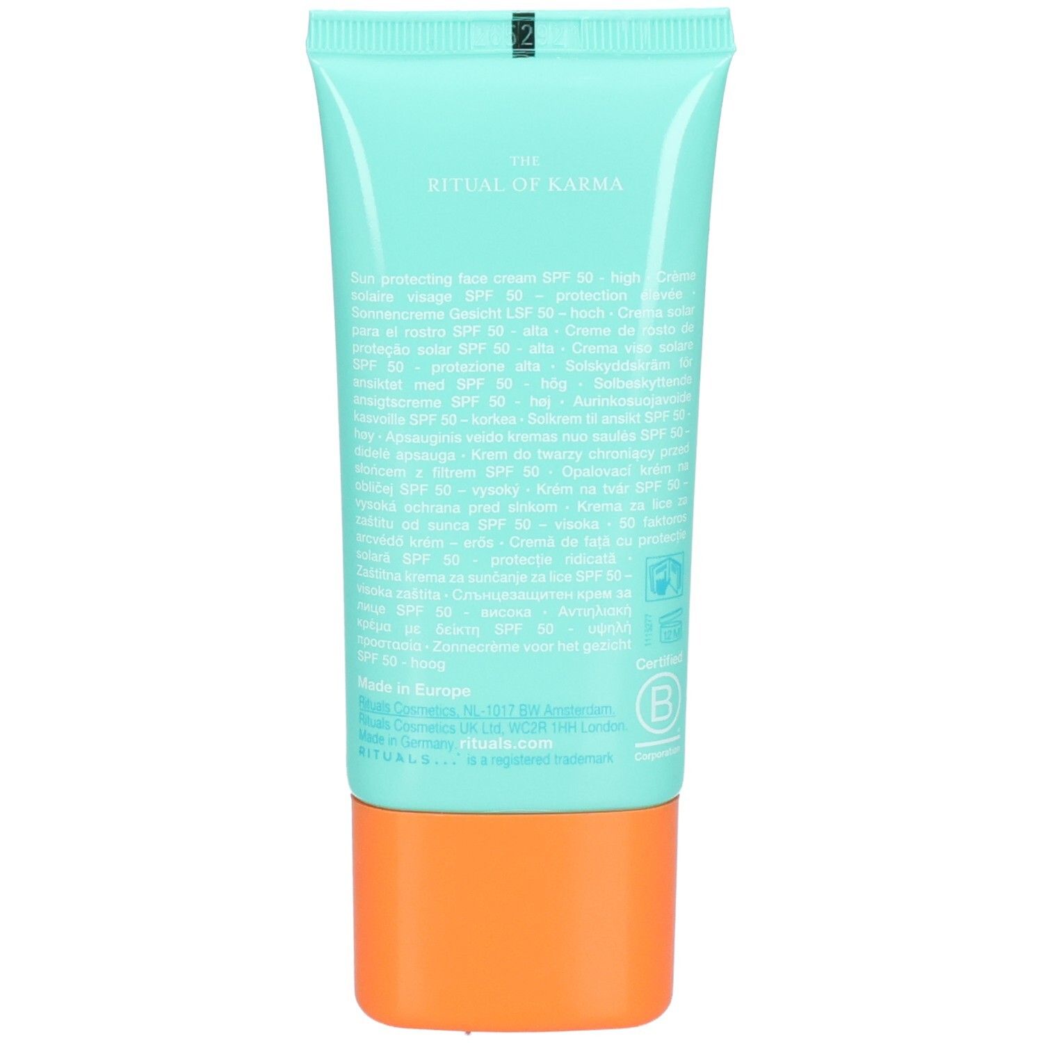 Retro di un tubo turchese di crema solare viso SPF 50. Contiene ingredienti e certificazioni.