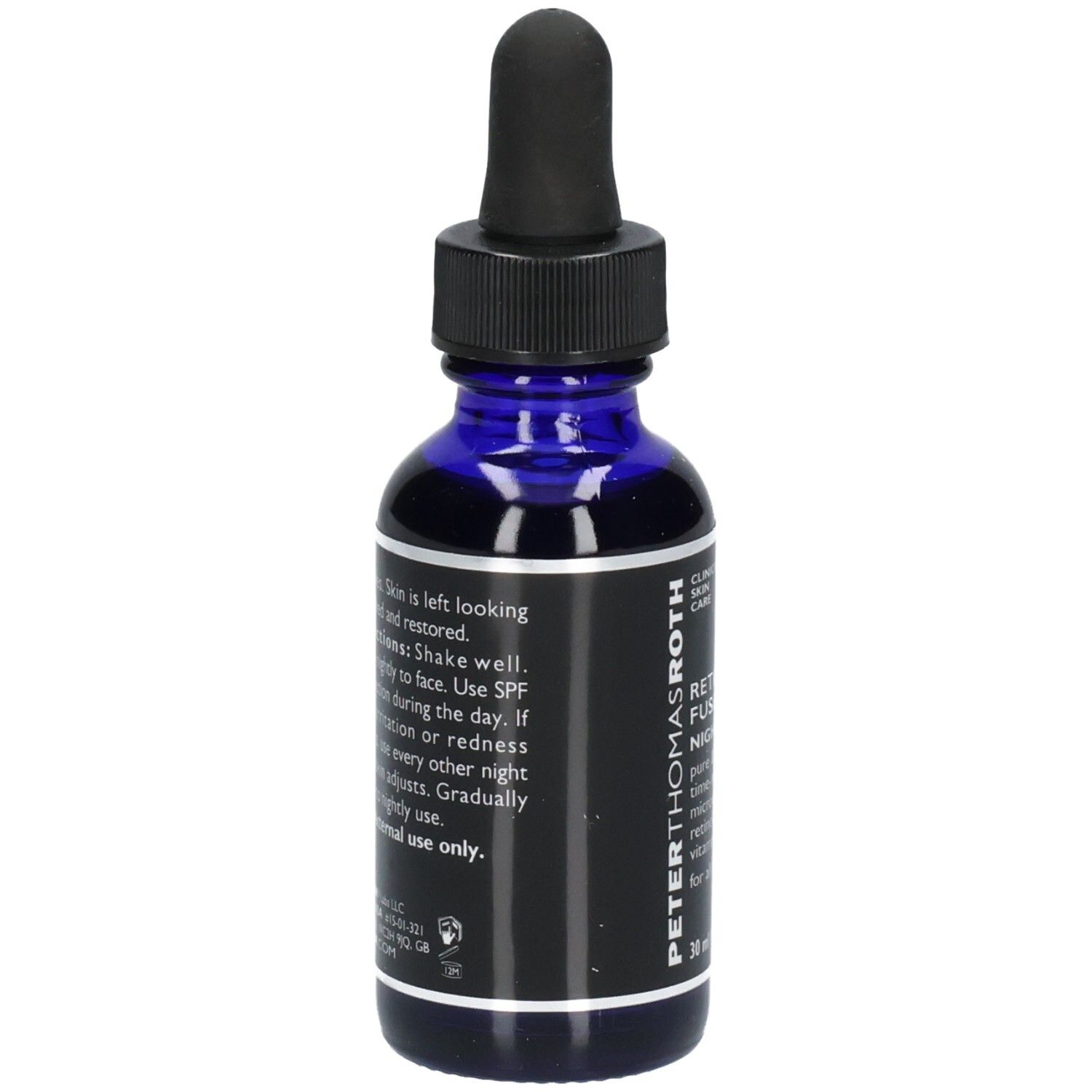 Retro del flacone Peter Thomas Roth Retinol Fusion PM Night Serum con istruzioni per l'uso e ingredienti.