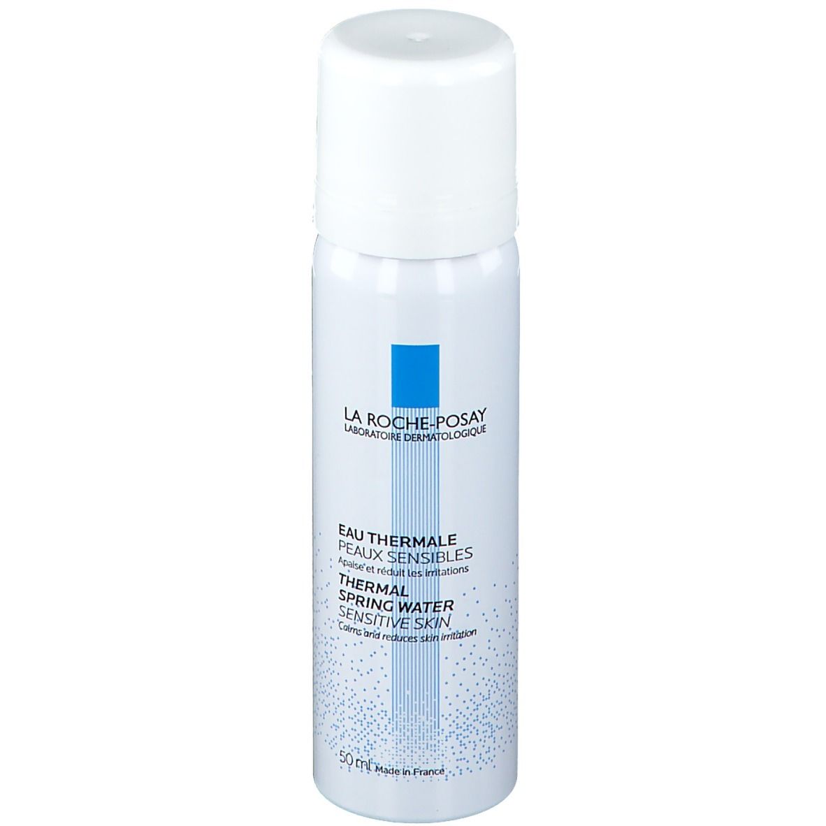 Spray bianco con logo blu. Testo: Eau Thermale, Peaux Sensibles, Thermal Spring Water, Sensitive Skin. 50 ml.