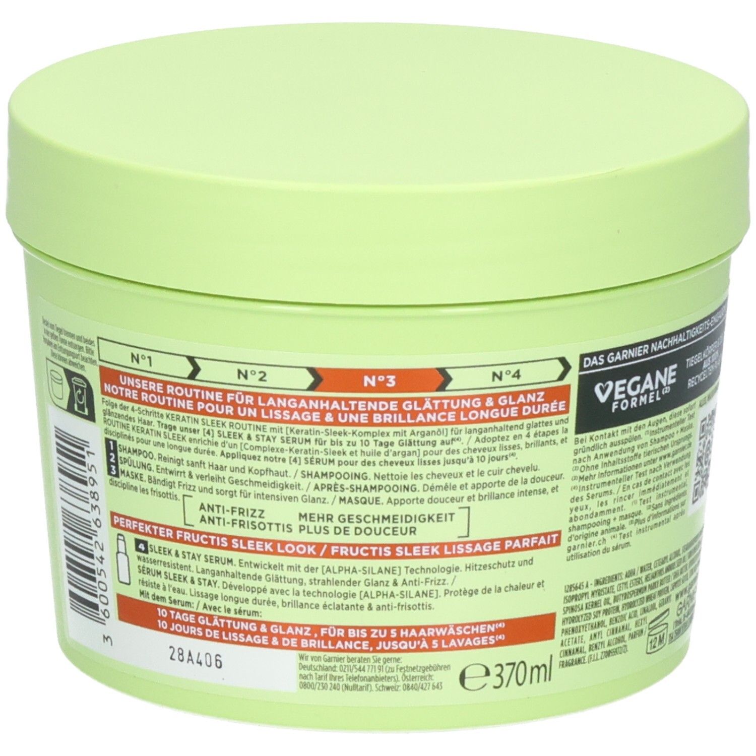 Contenitore verde con prodotto per la cura dei capelli. Contiene informazioni su una routine per capelli lisci e luminosi.