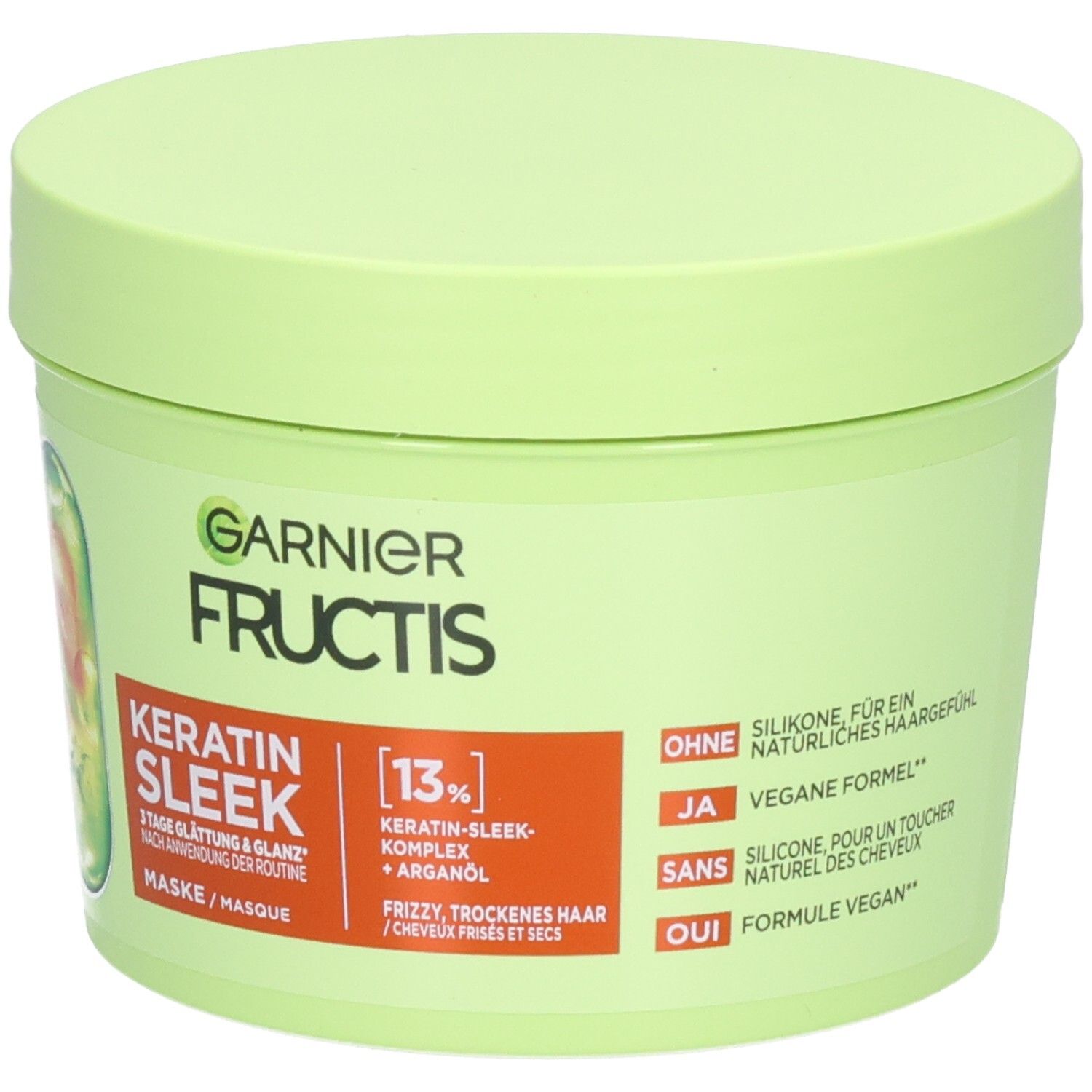 Maschera Garnier Fructis Keratin Sleek in barattolo verde chiaro. Contiene 13% di complesso Keratin-Sleek.