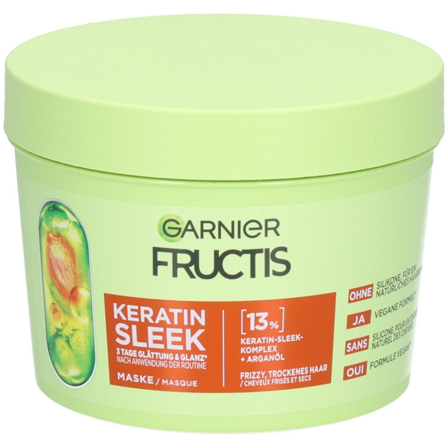Maschera Garnier Fructis Keratin Sleek in barattolo verde chiaro. Contiene 13% di complesso Keratin-Sleek e olio di argan.