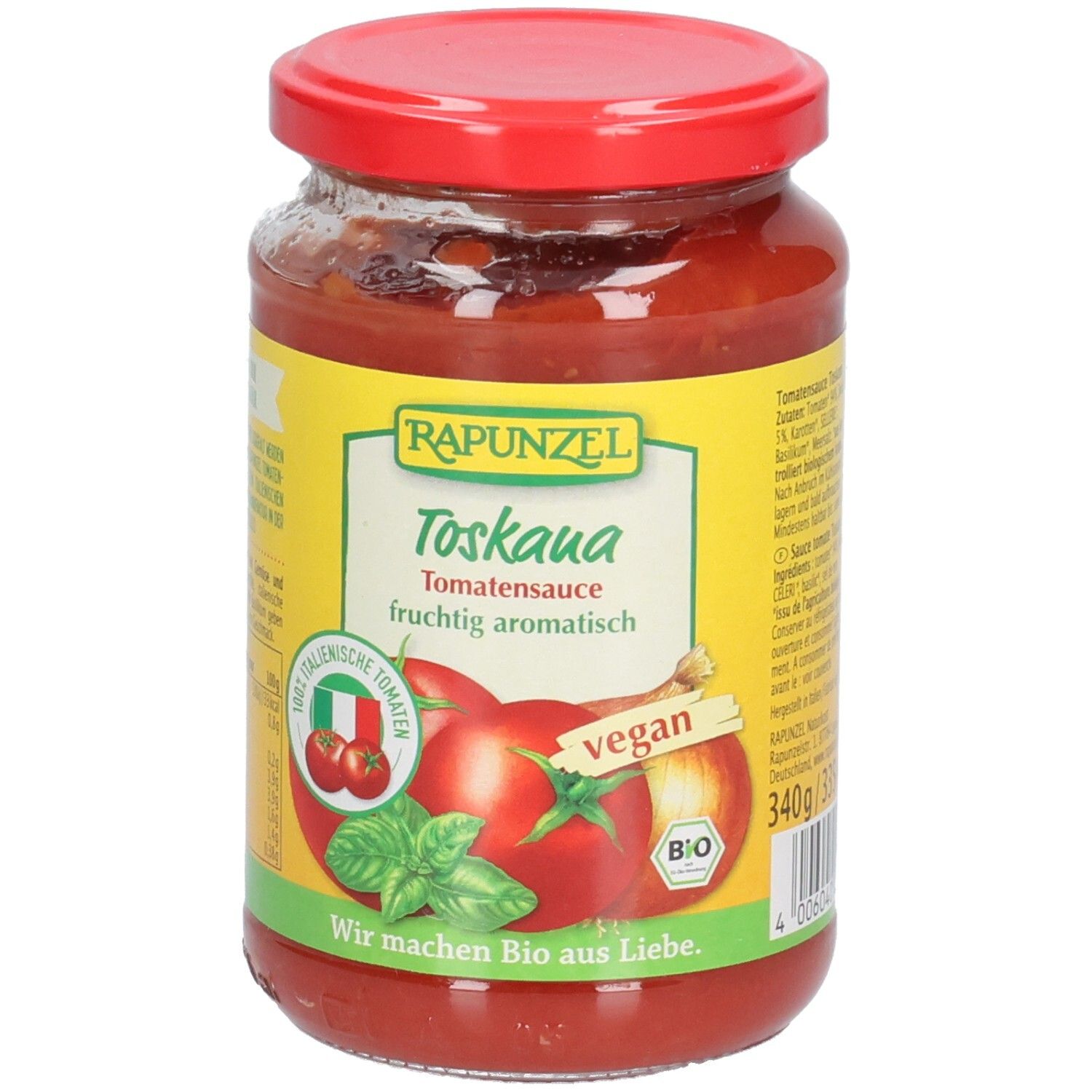 Vasetto di salsa di pomodoro Toskana. Etichetta con nome del prodotto, illustrazione di pomodori, logo vegano e marchio bio. Coperchio rosso.