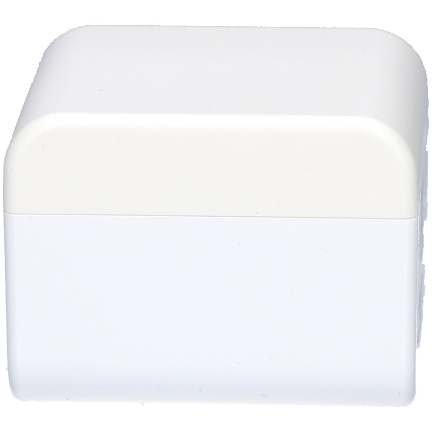 Contenitore bianco, rettangolare, con angoli arrotondati. Parte superiore chiara. Nessuna scritta visibile.