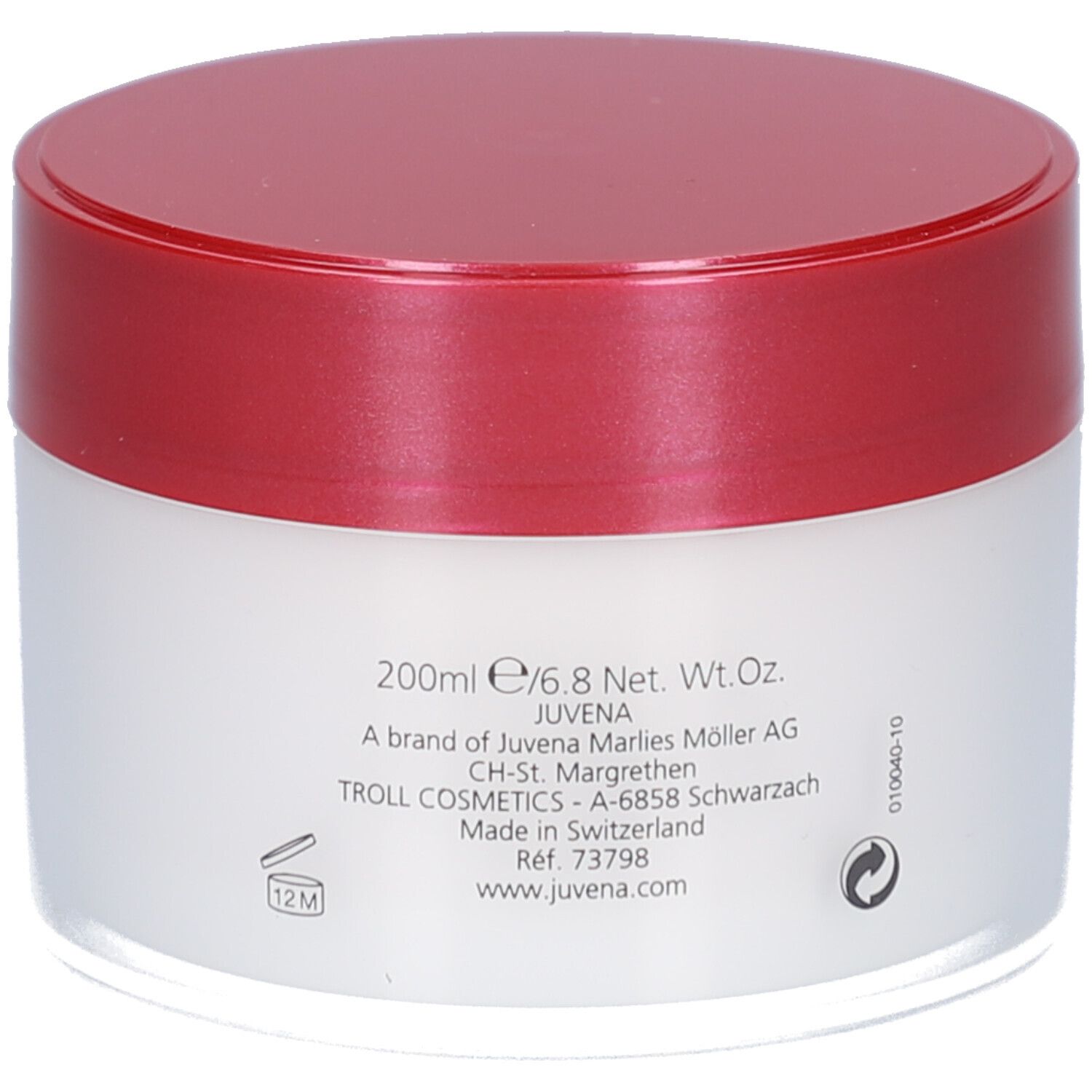 Vaso di crema con coperchio rosso. Scritta: Juvena. Testo: Body Care, Rich and Intensive Body Care Cream. Retro.