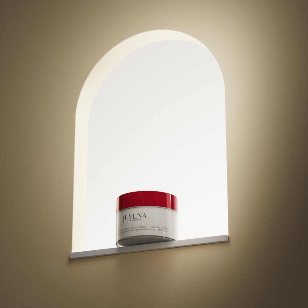 Vaso di crema con coperchio rosso in una nicchia. Scritta: Juvena. Nome del prodotto illeggibile.