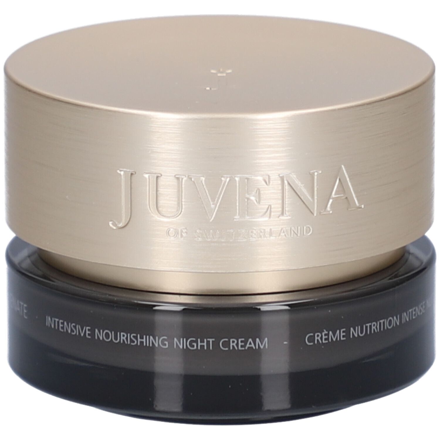 Vaso di crema scuro con coperchio dorato. Scritta: JUVENA OF SWITZERLAND. Testo: Intensive Nourishing Night Cream.