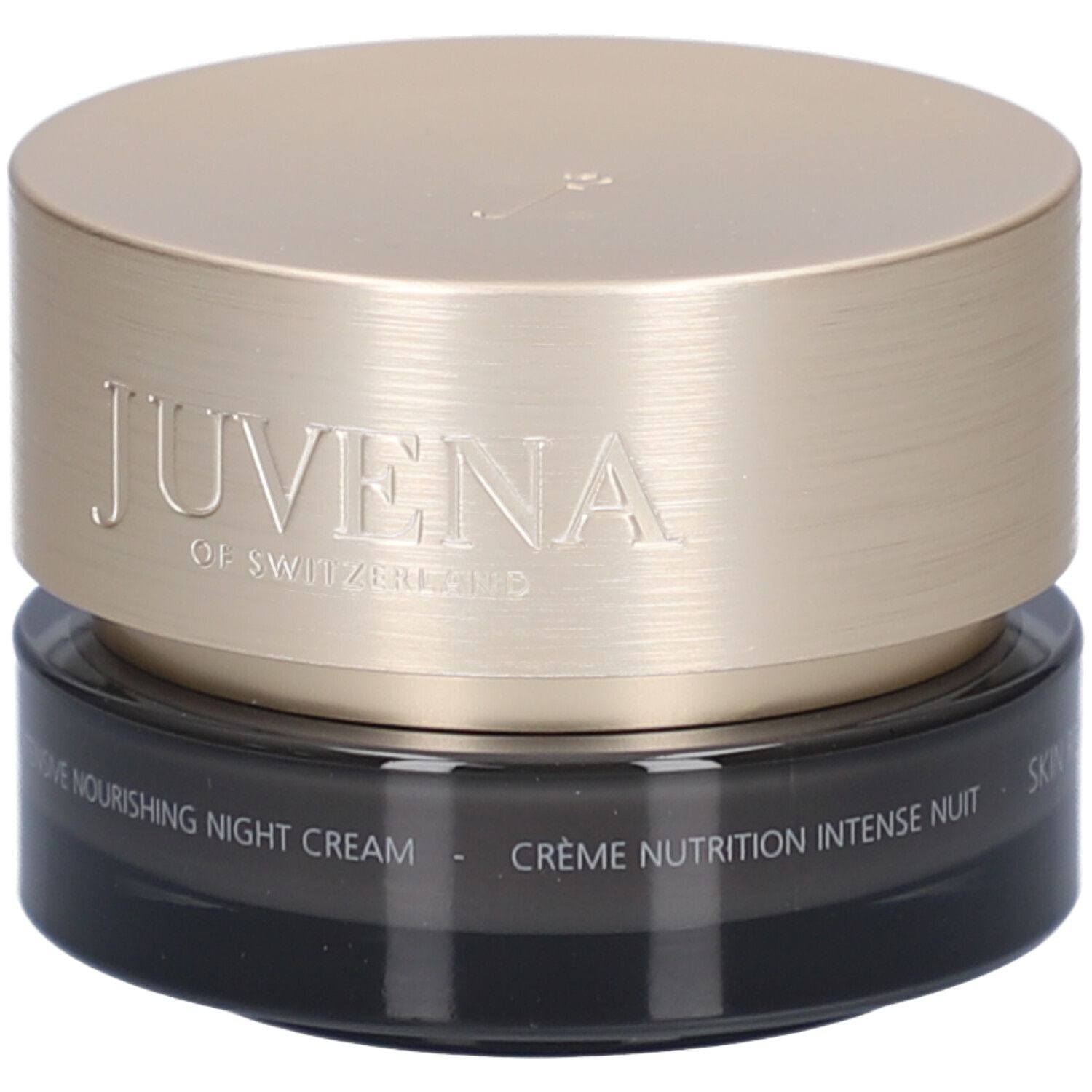 Vaso di crema scuro con coperchio dorato. Scritta: JUVENA OF SWITZERLAND. Testo: Intensive Nourishing Night Cream.