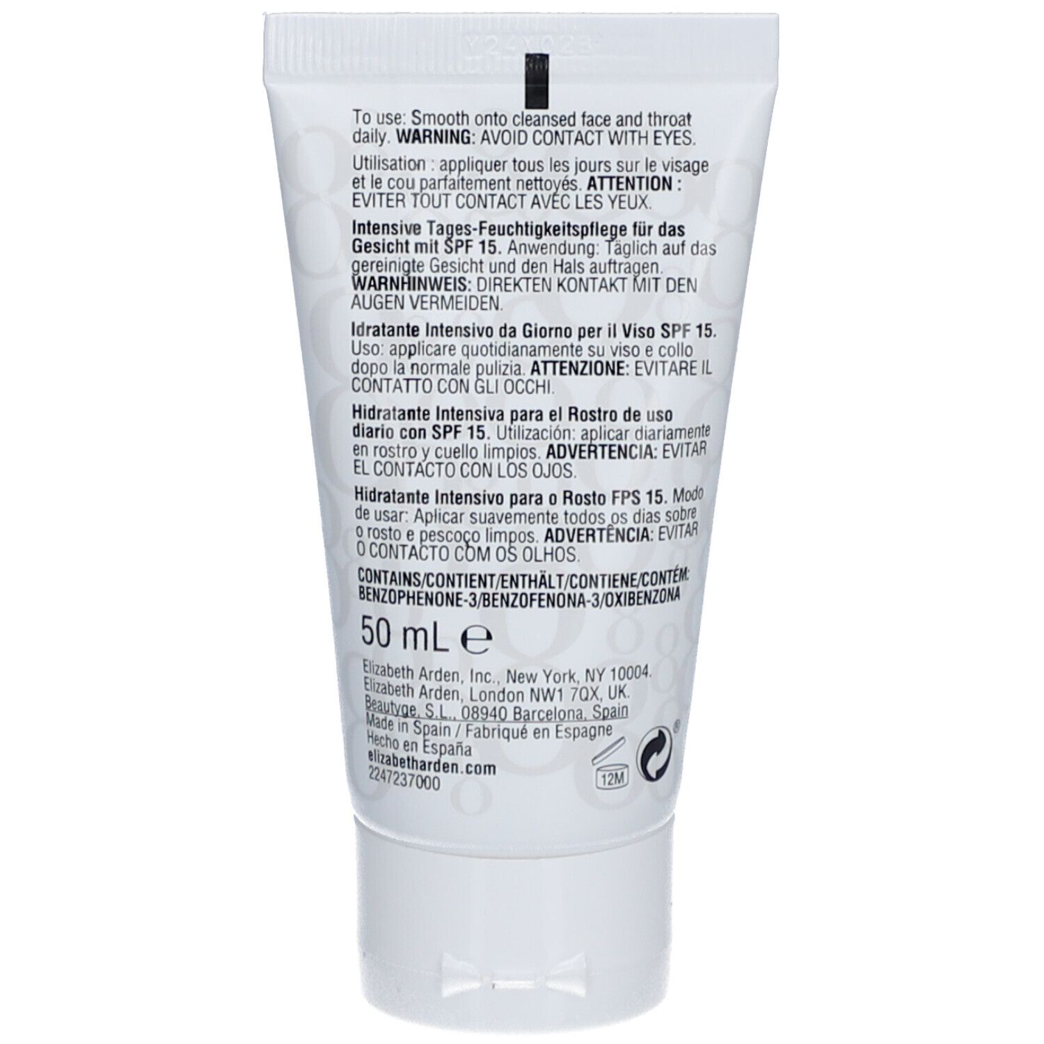 Retro del tubo bianco. Testo multilingue, istruzioni per l'uso e ingredienti inclusi.