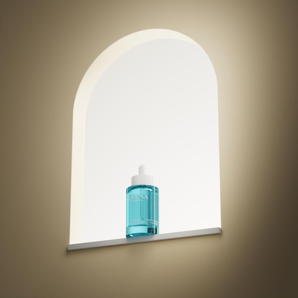 Flacone turchese con tappo bianco e pipetta in una nicchia. Scritta: JUVENA.