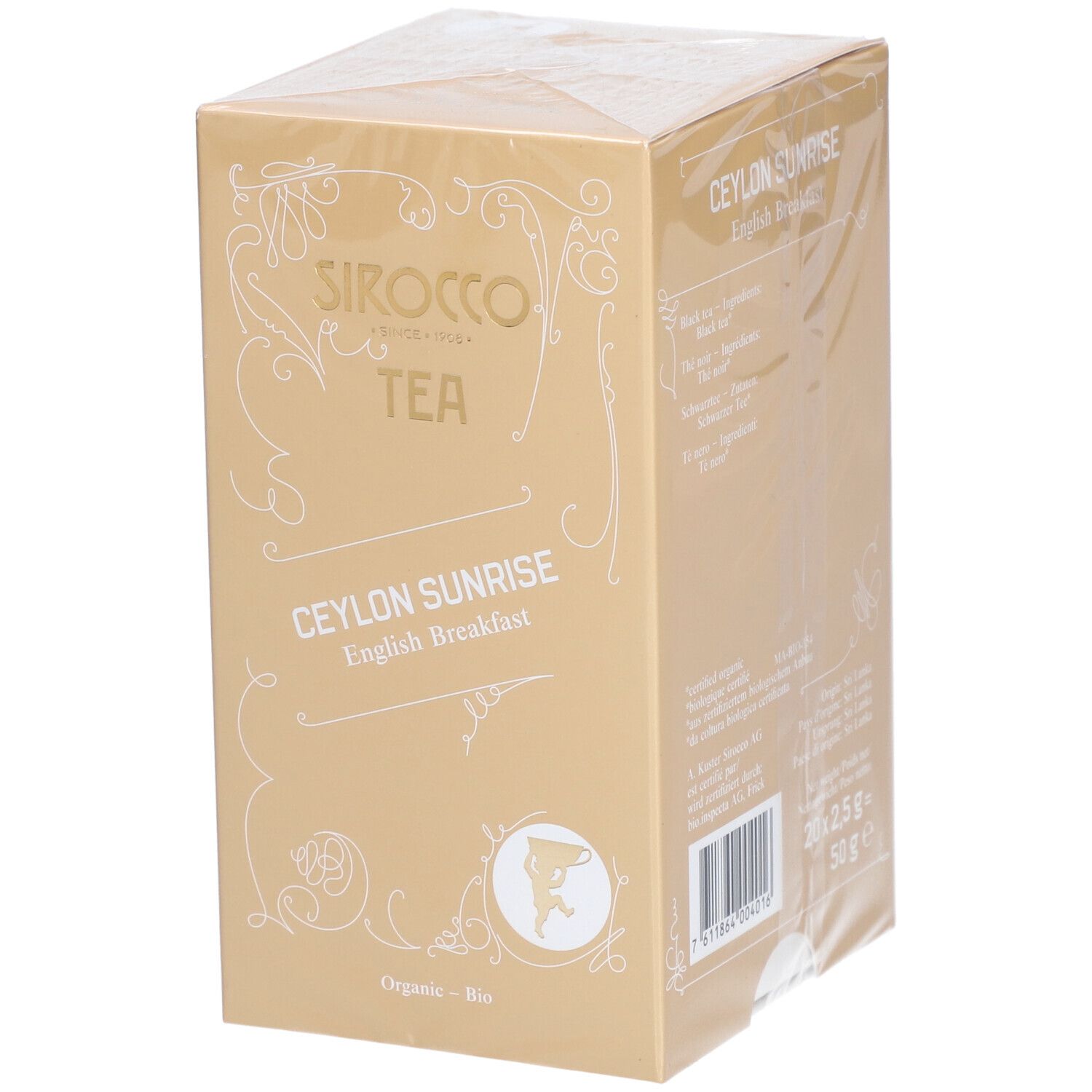 Confezione di tè Sirocco. Scritta: Ceylon Sunrise English Breakfast. Scatola dorata con testo bianco e logo.