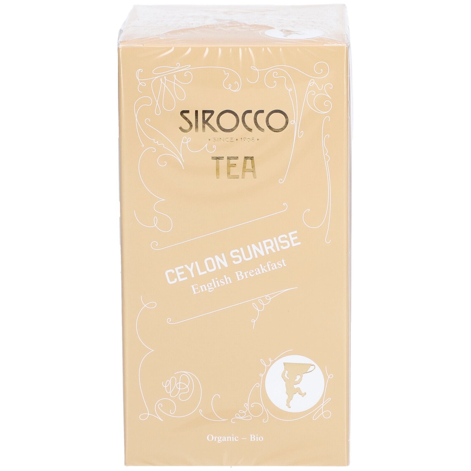 Fronte della confezione di tè. Scritta: Sirocco Tea, Ceylon Sunrise English Breakfast. Scatola dorata con logo.