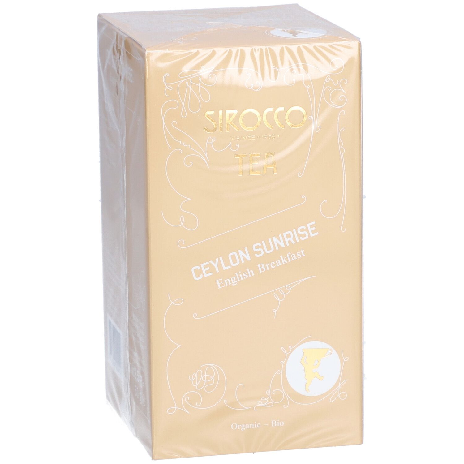 Confezione di tè Sirocco. Scritta: Ceylon Sunrise English Breakfast. Scatola dorata con testo bianco e logo.
