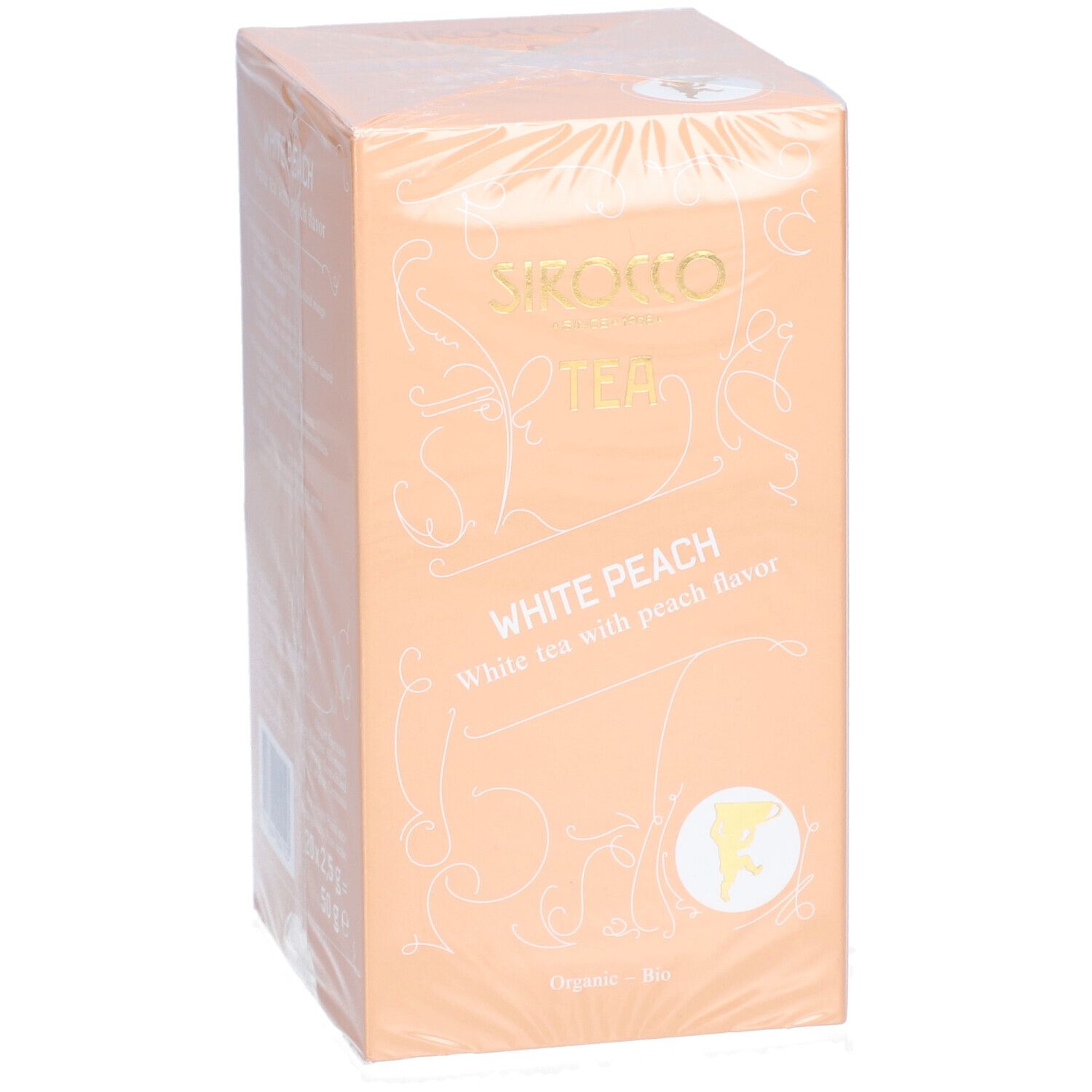 Scatola di tè avvolta in pellicola. Scritta: Sirocco Tea, White Peach, tè bianco al gusto di pesca. Logo e testo dorati.