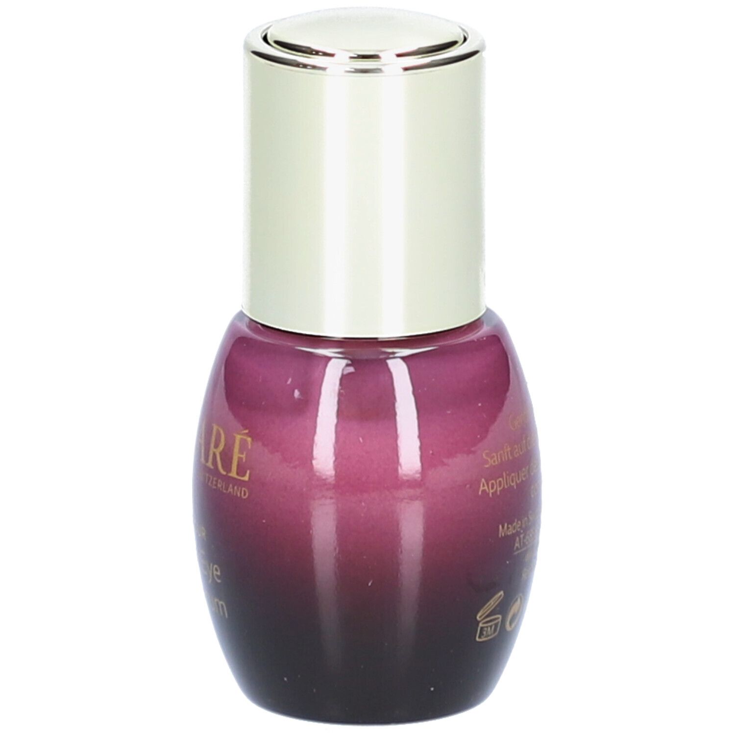 Flacone viola con tappo argentato. Testo sul retro.