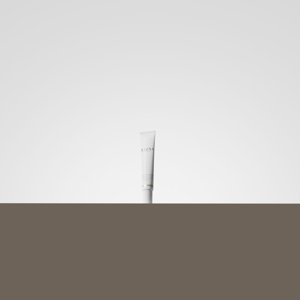 Tubo bianco su sfondo chiaro. Scritta illeggibile.