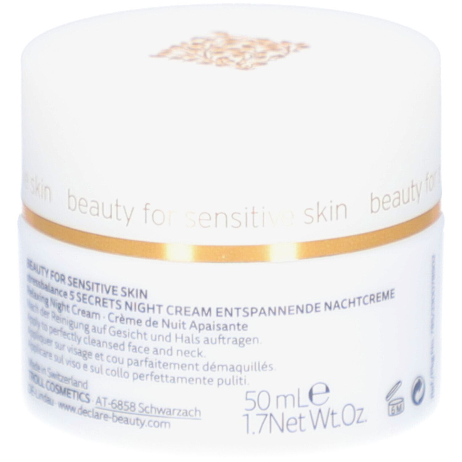 Vasetto bianco con coperchio dorato. Scritta: DECLARÉ, 5 Secrets Night Cream. Testo sul lato, 50 ml.