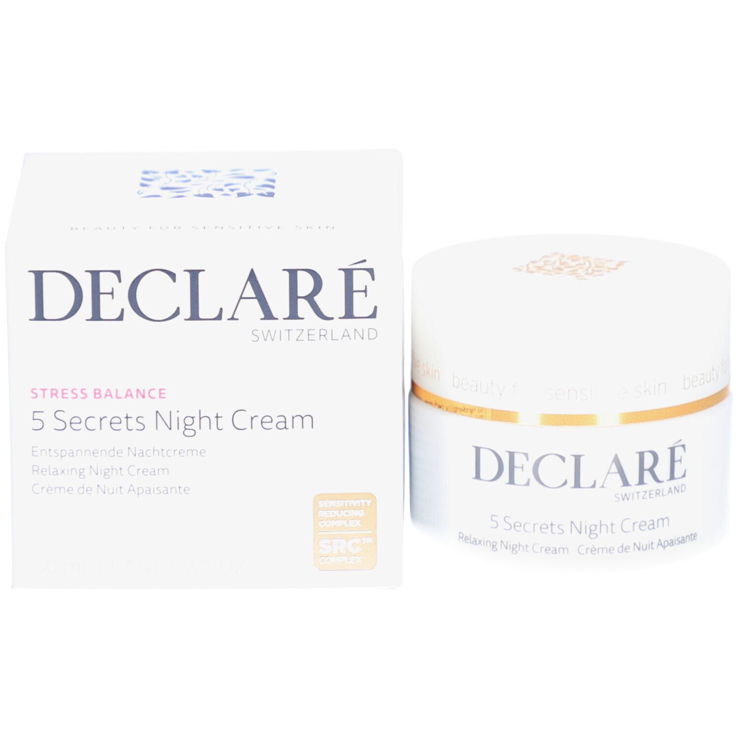 Vasetto e scatola bianchi. Scritta: DECLARÉ, 5 Secrets Night Cream. Testo: Stress Balance, Crema notte rilassante.