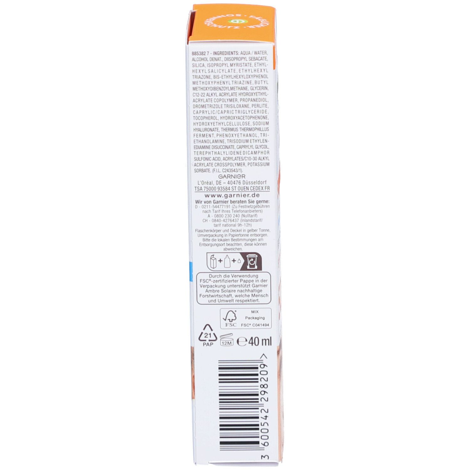 Lato della confezione Garnier Ambre Solaire. Testo: Ingredienti, simboli di riciclaggio, volume 40ml.