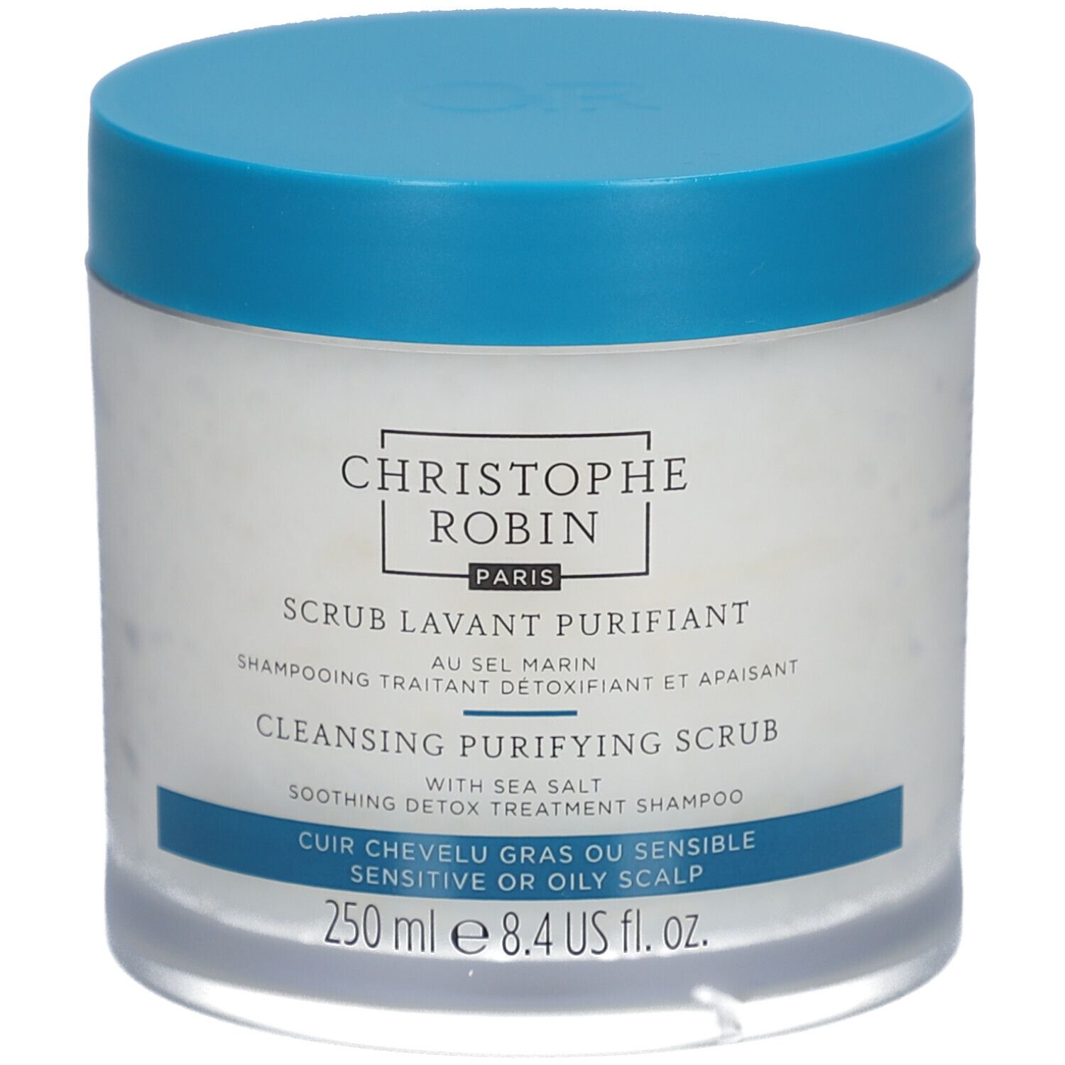 Barattolo rotondo con coperchio blu. Scritta: CHRISTOPHE ROBIN PARIS, SCRUB LAVANT PURIFIANT, CLEANSING PURIFYING SCRUB, 250 ml.