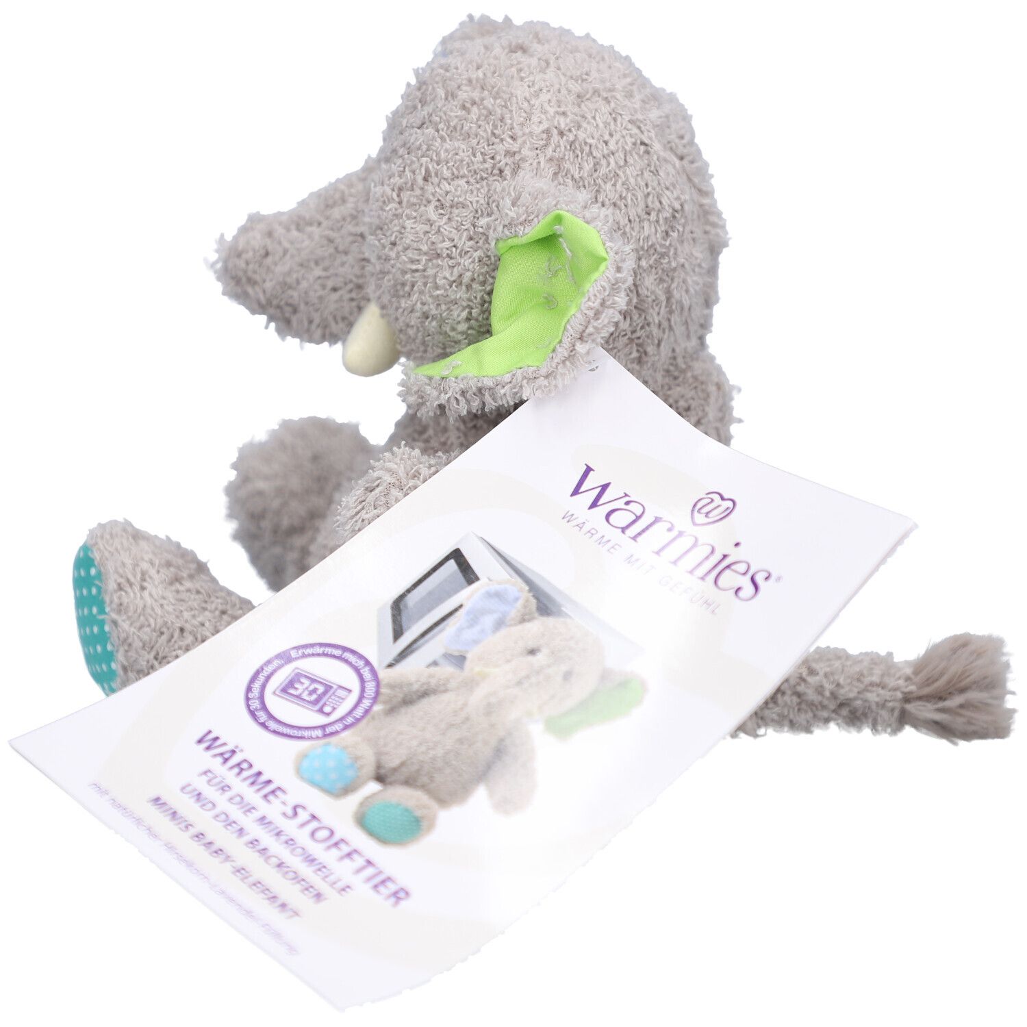 Elefante di peluche grigio con etichetta. Stampa: microonde, elefante baby. Logo Warmies®.