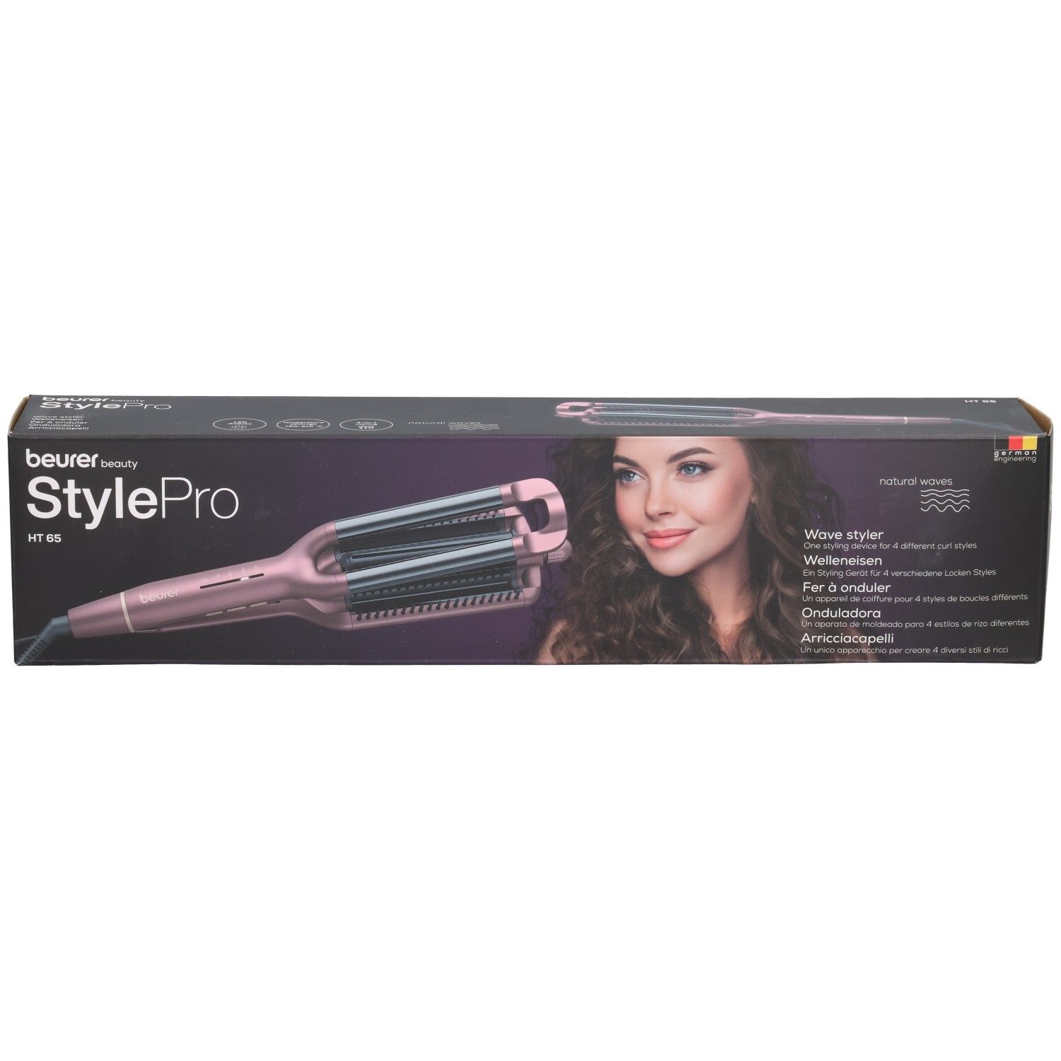 Arricciacapelli Beurer StylePro HT 65 nella confezione. Dispositivo rosa con piastre ondulate. Scritte: Wave Styler, onde naturali.