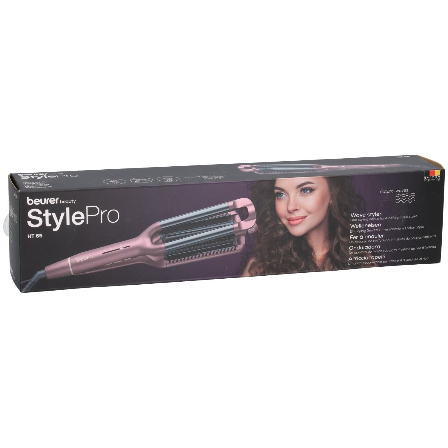 Arricciacapelli Beurer StylePro HT 65 nella confezione. Dispositivo rosa con piastre ondulate. Scritte: Wave Styler, onde naturali.