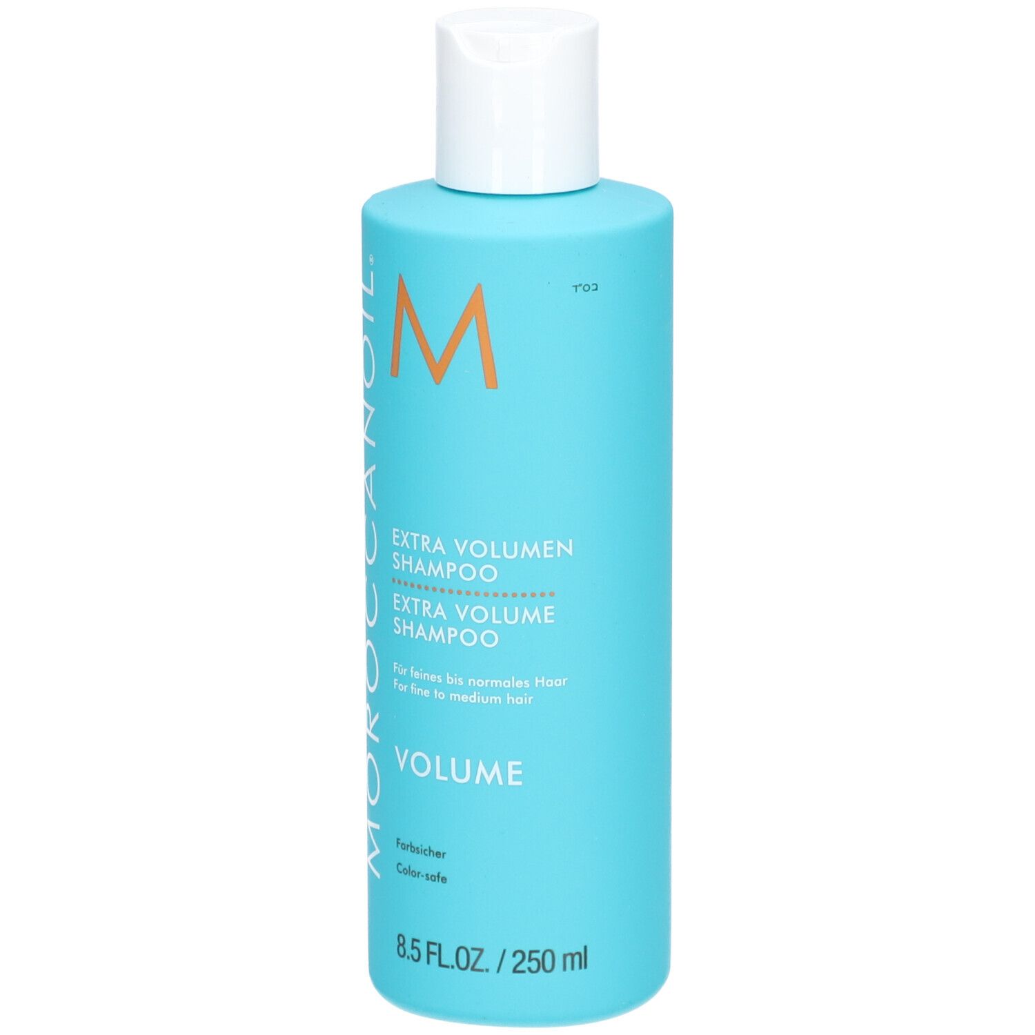 Flacone blu turchese con tappo bianco. Scritta: Moroccanoil, Extra Volumen Shampoo. 8.5 FL.OZ./250 ml.