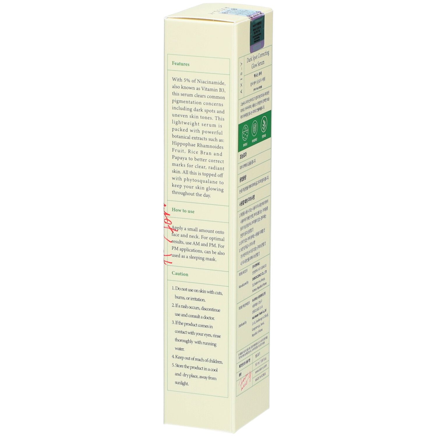 Confezione del prodotto con testo. Scritta: Dark Spot Correcting Glow Serum. Marchio: AXIS-Y. Contiene informazioni sugli ingredienti e l'uso.