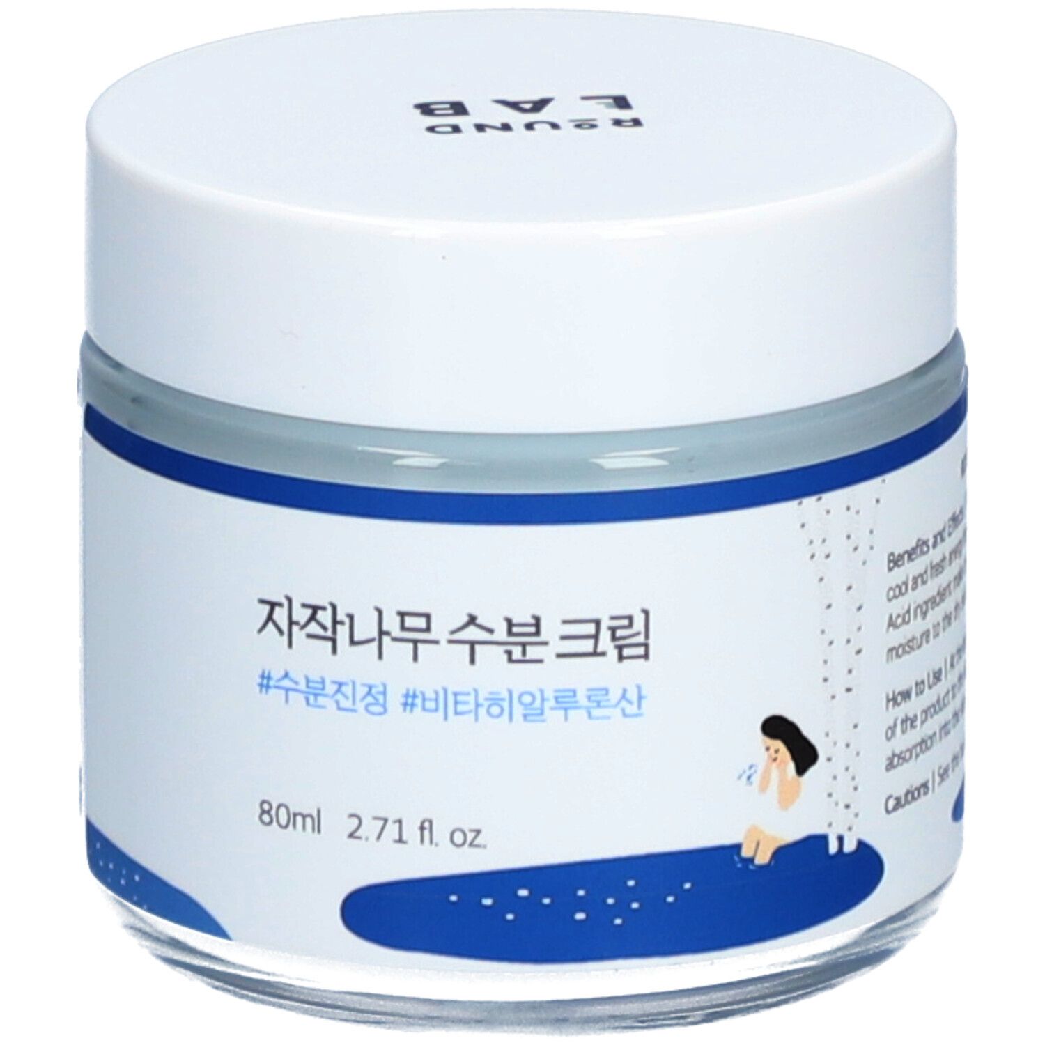 Vasetto di crema con coperchio bianco. Etichetta blu con testo coreano e illustrazione. 80ml.