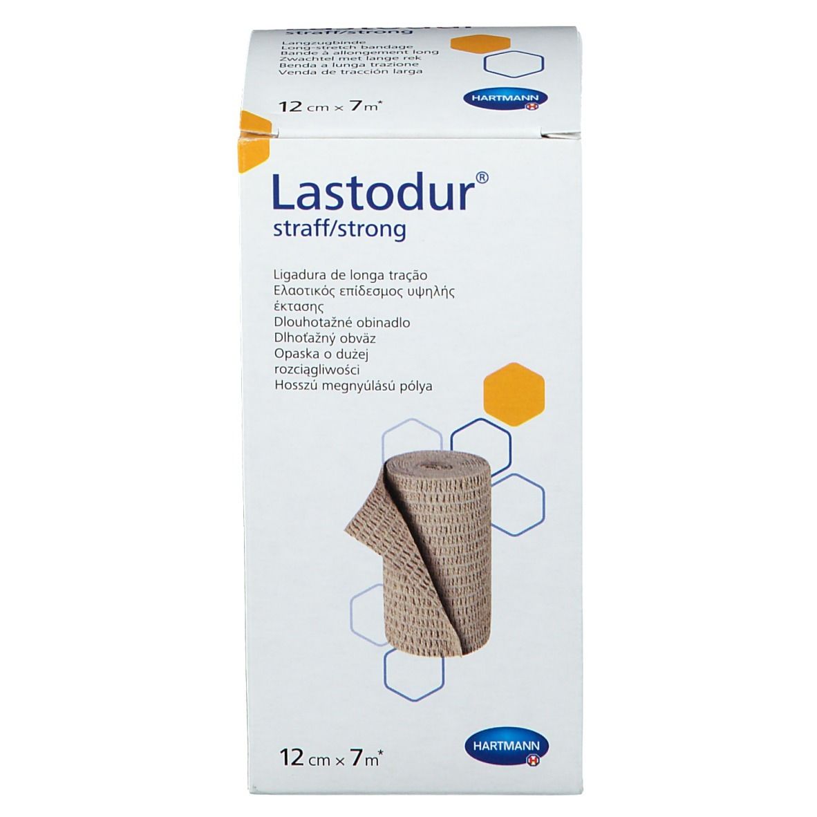 Confezione di Lastodur® strong. Benda beige in scatola. Dimensioni: 12 cm x 7 m. Nome del prodotto e marchio Hartmann.