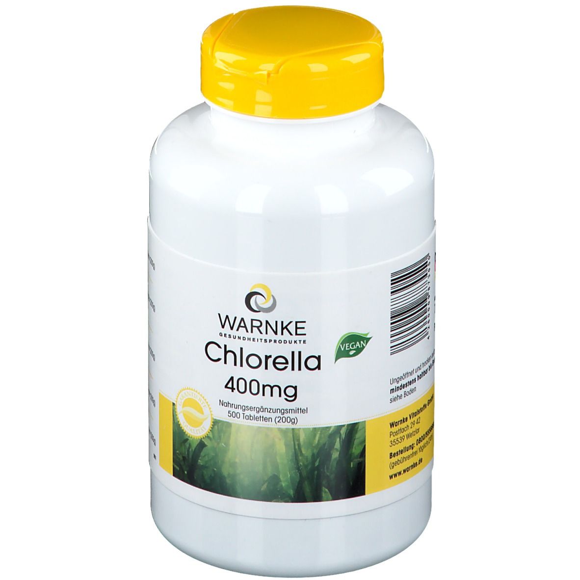 Flacone bianco con tappo giallo. Scritta: WARNKE Chlorella 400mg. Sigillo vegano. 500 compresse.