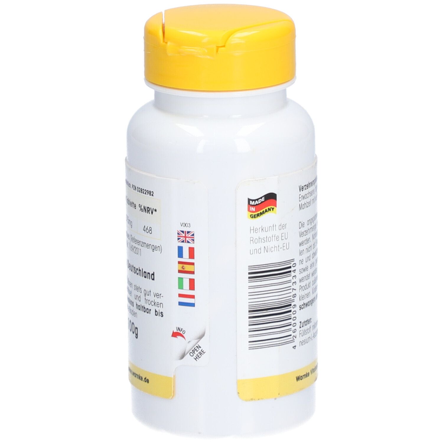 Retro del flacone bianco con tappo giallo. Testo in tedesco. Codice a barre e paese di origine.