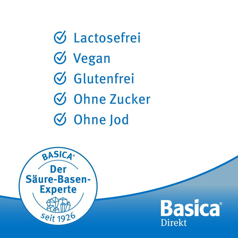Grafica blu con "Basica Direkt" e loghi. Testo: Senza lattosio, Vegano, Senza glutine, Senza zucchero, Senza iodio. Logo: L'esperto acido-base.