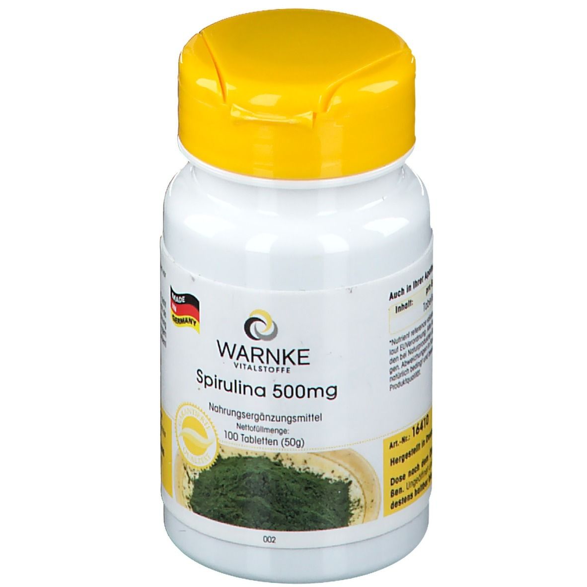Flacone bianco con tappo giallo. Scritta: WARNKE Vitalstoffe Spirulina 500mg. 100 compresse. Prodotto in Germania.